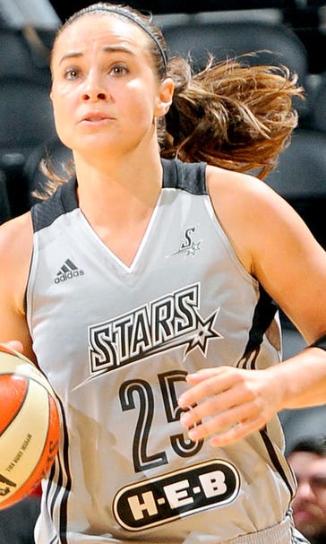 Hammon makes coaching history, but she's not quite done as a player